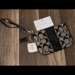 Coach Wristlet black and Grey. Brand New